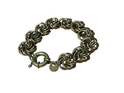 Lot 43 - Gilt metal horsebit bracelet, in the style of Gucci, Ermani Bulatti gilt metal bracelet, Italian Bronzallure oval link bracelet and a gilt disc bracelet (4)