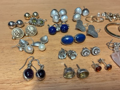 Lot 46 - Collection of mostly silver gem set earrings including a pair of silver gilt hoops, lapis lazuli studs, silver hearts etc