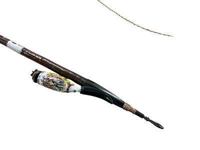 Lot 862 - Impressive Imperial German military pipe with porcelain Stummel bowl decorated with Uhlan and metal Lance cap cover, long turned wooden shaft with white metal horse mount with turned horn mouthp...
