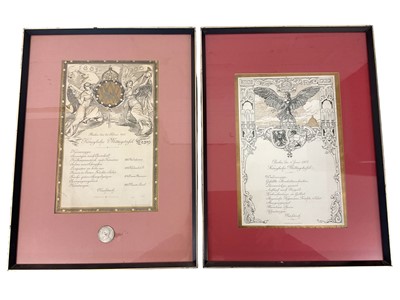 Lot 868 - Two Imperial German Royal menus for 4th June 1905 and 25th February 1906 with impressive Royal cipher and eagle decoration, mounted in glazed frames 43 x31.5cm