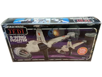 Lot 1730 - Kenner (c1984) Stars Wars Return of the Jedi B-Wing Fighter, original internal packaging & documentation, boxed (worn to edges) in DC Protector packaging, No.71370 (1)
