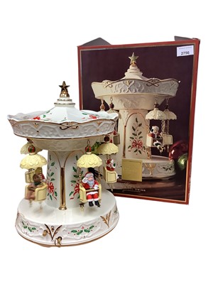 Lot 2756 - Christmas ornament- Lenox ceramic 'Holiday Carnival Swing' in original box, appears unused.