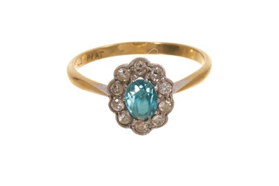 Lot 577 - Blue zircon and diamond cluster ring in platinum setting on 18ct gold shank