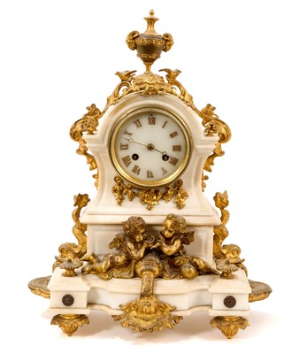 Lot 805 - 19th century French alabaster and ormolu mantel clock