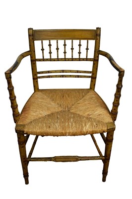 Lot 1563 - Regency faux bamboo open armchair