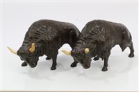 Lot 1012 - Pair of antique bronzed models of bison - each...
