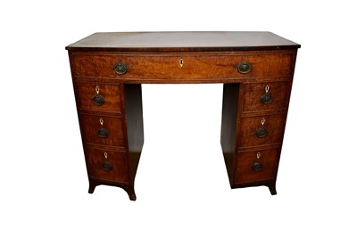 Lot 1567 - Early 19th century plum pudding mahogany bowfront dressing table