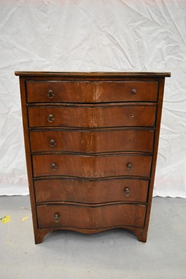 Lot 1576 - 19th century mahogany miniature serpentine chest of six drawers