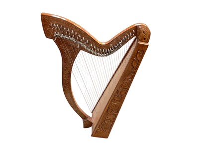 Lot 2205 - Modern carved walnut harp