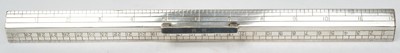 Lot 411 - Unusual silver weighted desk rule, J Vickery, London 1920