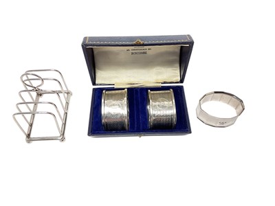 Lot 412 - Modernist silver napkin rings by Robert Edgar Stone, London 1932 and other items