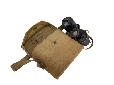 Lot 708 - Pair of Second World War British military binoculars by Bausch & Lomb in canvas case, stamped M.E.Co. 1940 and marked with broad arrow.