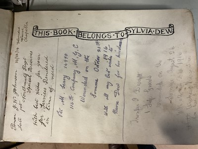 Lot 704 - First World War Nurses scrap album, belonging to Nurse Sylvia Dew, the album contains drawings and entries from wounded soldiers and photographs of Nurses.