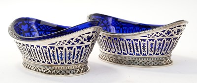 Lot 323 - Pair of Victorian pierced silver dishes with blue glass liners