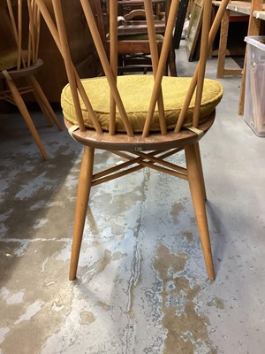Lot 1204 - Ercol dining table with extension together with six chairs