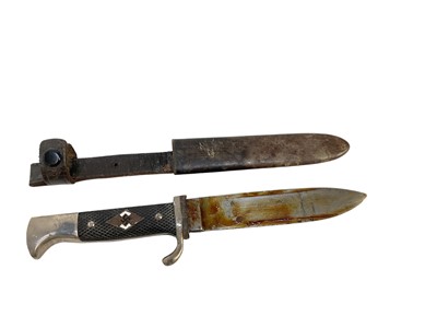 Lot 852 - Nazi Hitler Youth knife / dagger with checkered plastic grip, set with enamel swastika badge, plated mounts, blade by Carl Eickhorn marked RZM M7/66, 39