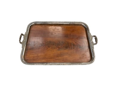 Lot 1655 - 19th century silver plated serving tray with mahogany base