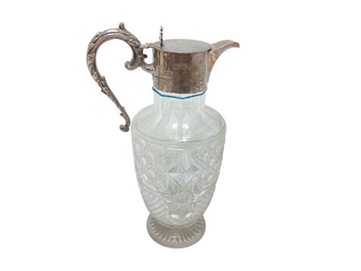 Lot 433 - Early 20th century silver mounted cut glass claret jug by William Hutton & Sons