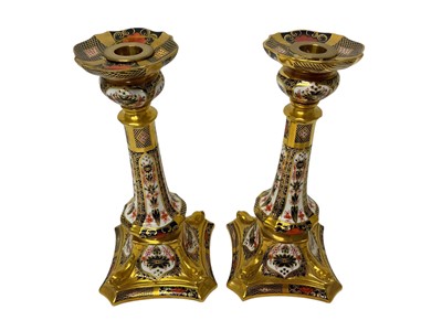 Lot 119 - Pair of Royal Crown Derby porcelain Imari pattern candlesticks