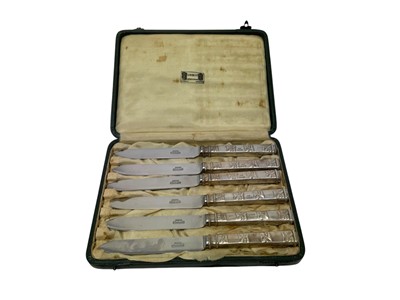 Lot 388 - Cased set of six silver handled knives by Liberty and Co, in origina...