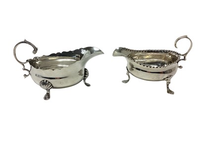 Lot 319 - George III sauceboat and a Georgian style sauceboat