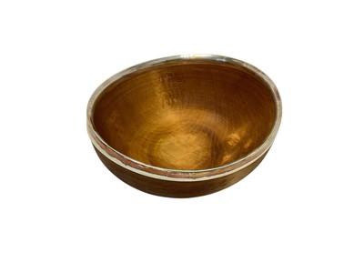 Lot 399 - Wooden mazer bowl with silver rim