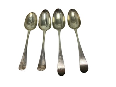 Lot 377 - Four various early-mid 18th century table spoons, two with rococo sc...