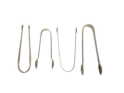 Lot 324 - Four various Georgian sugar nips