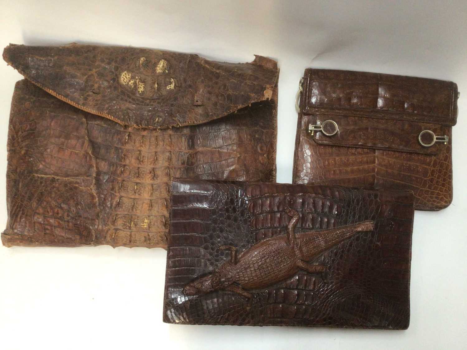Lot 2091 - Vintage accessories including crocodile skin handbags and other handbags, pair of high lace-up boots, silk sari, scarves and hats in a hat box.