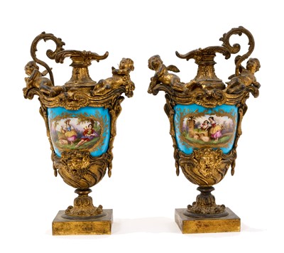 Lot 1017 - Pair of good quality French 19th century ormolu and porcelain ewer shaped urns