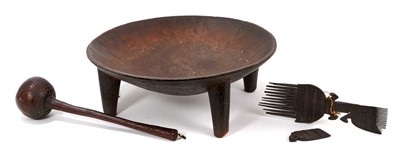 Lot 1114 - Fijian throwing club, large footed tribal bowl and a comb