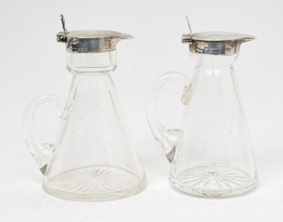 Lot 338 - Two silver mounted glass whiskey tots/chota pegs