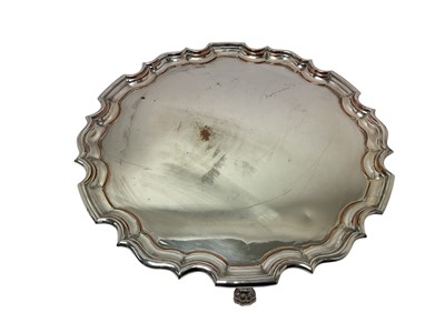 Lot 340 - Very large George II style silver on copper tray/salver with piecrust edge on four lions paw feet