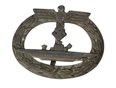 Lot 705 - Nazi U-boat War badge, with broad pin fitting, the badge retaining some traces of original gilt finish.