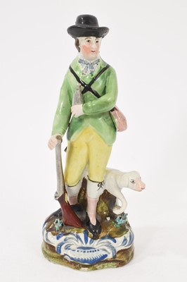 Lot 233 - Pearlware figure of a sportsman, circa 1820