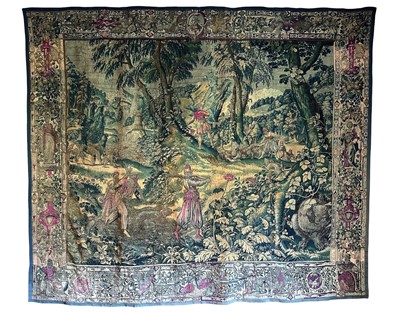 Lot 1570 - A late 16th century Flemish tapestry worked with bear hunting scenes in a mountainous forest