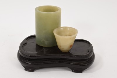 Lot 913 - Two Chinese jade vessels: a cup and a cylinder