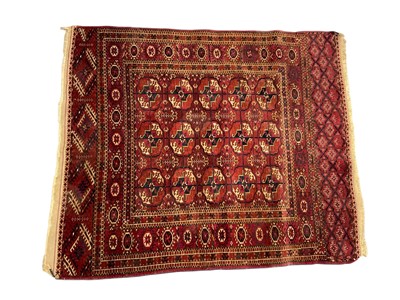 Lot 1745 - Tekke Turkoman rug on red ground