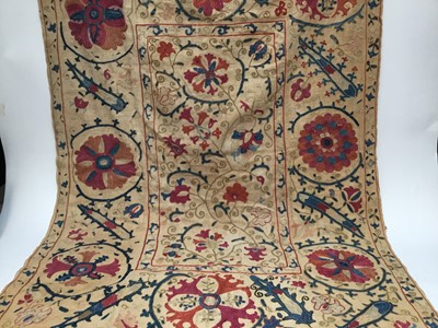 Lot 2050 - Antique embroidered Suzani with scrolling foliage on cream ground