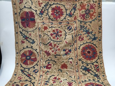 Lot 2050 - Antique embroidered Suzani with scrolling foliage on cream ground
