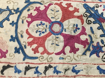 Lot 2050 - Antique embroidered Suzani with scrolling foliage on cream ground