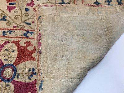 Lot 2050 - Antique embroidered Suzani with scrolling foliage on cream ground