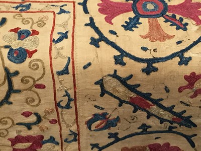 Lot 2050 - Antique embroidered Suzani with scrolling foliage on cream ground