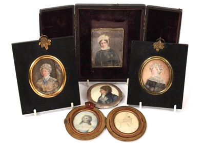 Lot 876 - Two 18th century oval portrait miniatures on ivory