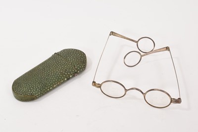 Lot 855 - Pair of Georgian folding silver rimmed glasses in shagreen case