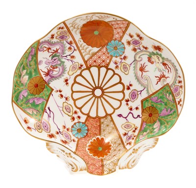 Lot 81 - A rare English shell-shaped dessert dish, decorated in the Japanese style with the 'Brocade' pattern, comprising panels of dragons and flowers,...