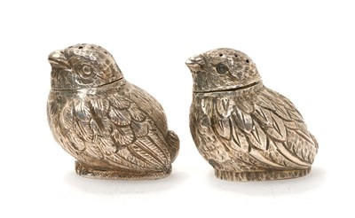 Lot 262 - Pair of Edwardian silver chick pepperettes