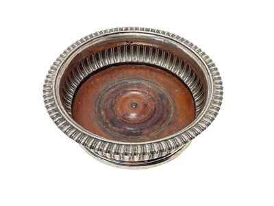 Lot 267 - Georgian silver wine coaster