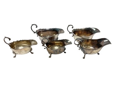 Lot 279 - Five various silver/silver plated sauce boats
