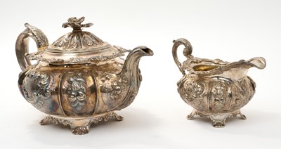 Lot 280 - Good George IV silver teapot of melon form and ensuite cream jug